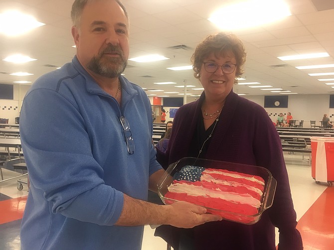 Kay and Pat Rizzuto with their American Flag cake.