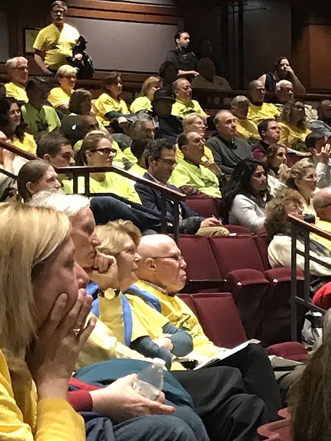 Many audience members at the Public Hearing for the Planning Commission Meeting Jan. 23, on Zoning Ordinance Amendment wear yellow shirts to show their unified opposition to the proposed amendment.