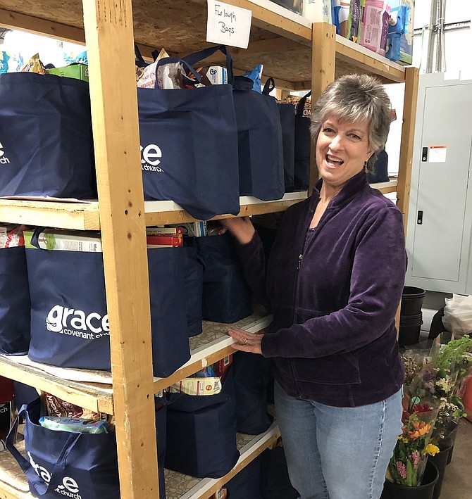 WFCM volunteer Kitty Beachy helped fill 25 bags of nonperishable food to distribute to furloughed government workers.