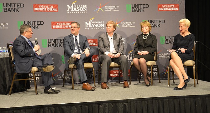 A panel representing different segments of business in the region answered questions about the arrival of Amazon, the impact of the government shutdown, and how they viewed the economy going into 2019. From left, moderator Peter Abrahams, the Washington Business Journal; Jordan Goldstein, regional managing principal, Gensler; Marc Wilson, SVP global partnerships & industries and co-founder, Appian; Kim Horn, president, Kaiser Permanente Health Plan of the Mid-Atlantic States; and Catherine Meloy, president and CEO, Goodwill of Greater Washington.