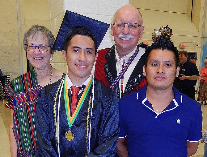 Brayan Brito’s June 2018 graduation from Mountain View: Friends Alice and Jerry Foltz with grad Brayan Perez Brito and his brother, Diego Chavez Brito.