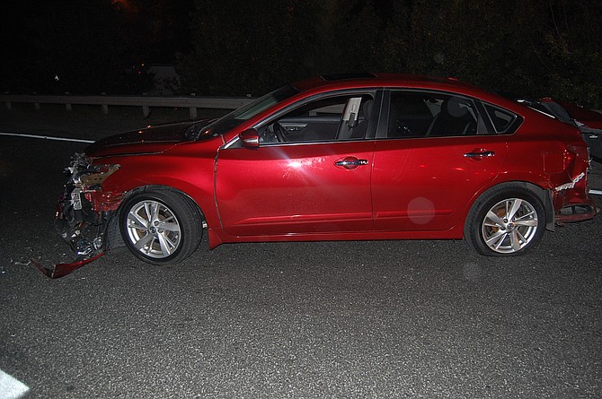 The hit-and-run victim’s vehicle after colliding with the RV and then being hit by the suspect vehicle.