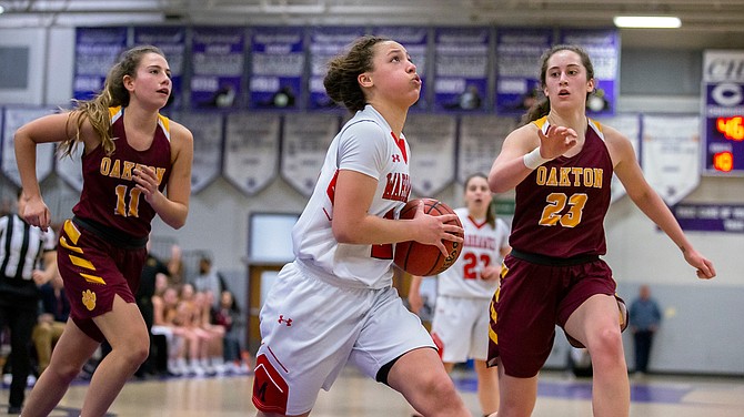 Grace Arnolie #21, scored 17 points to lead Madison to the Concorde District Championship.