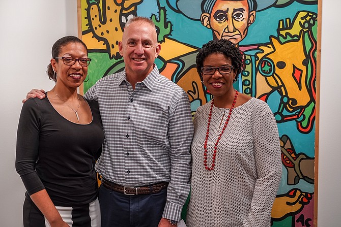 Marty Schnider, president of Fred Schnider Investment Group, LLC and Founder of the Fred Schnider Gallery of Art, with Allen “Big Al” Carter’s daughters, Cecilia Carter (left) and Flora O. Stone (right).