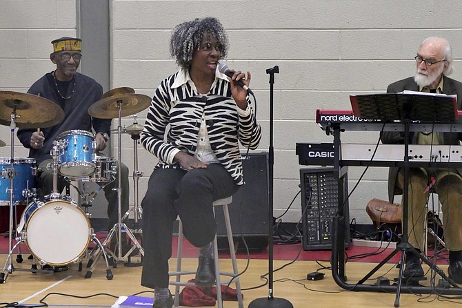 Karen Lovejoy, vocalist and band conductor with the Lovejoy Group,  entertains at the Black History Month celebration and luncheon Feb. 22 at Langston-Brown Community Center. She says she has chosen a selection of tunes from Nat King Cole to celebrate the Cole Centennial as well as traditional blues and jazz.
