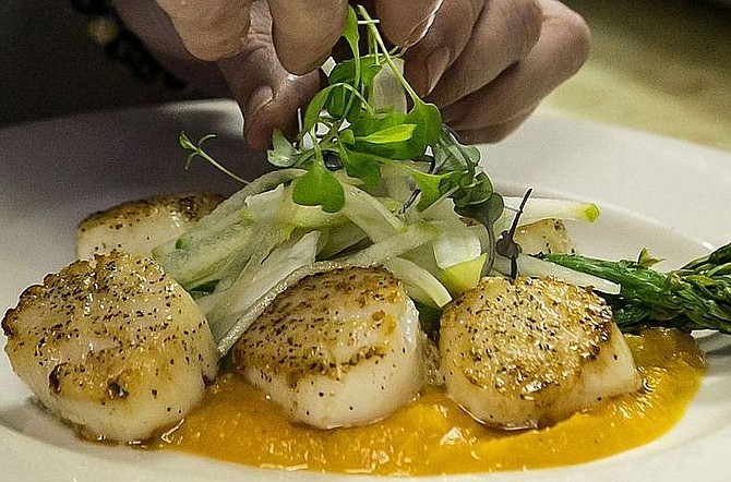 A dish of scallops at Dolce Vita.