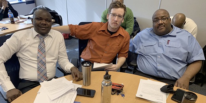 DASH bus drivers, part of ATY Local 689's collective bargaining negotiating committee. From left are Didier Balagizi, Tyler Boos, and Alphonza "Big Al" Clements.