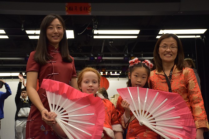 BIM Mandarin teachers, Ms. Hao Wang and Ms. Carrie Tozzi, with BIM students Rebecca Tanesi and Evelyn Zheng.