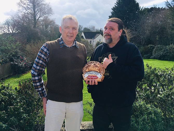 Pure Pasty of Vienna owner Michael Burgess and chef Stuart Moll display their World Championship trophy.