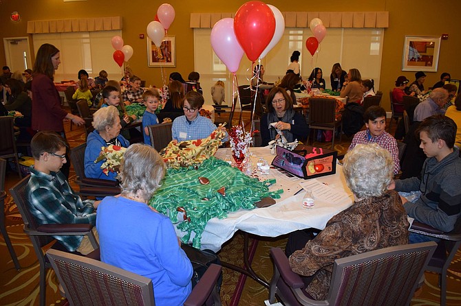 An Intergenerational event with the Potomac School brought students and seniors together at Vinson Hall to assemble Valentine’s Day care packages that were delivered to wounded warriors at area hospitals.