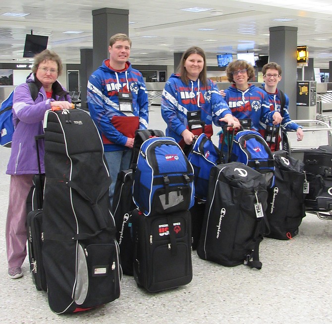 From left, Special Olympics Athletes Grace Anne Braxton of Fredericksburg, Dylan Joseph "Joey" Roney of Herndon, Jenny Mitchell of Alexandria, Karen Dickerson of Springfield and Victoria "Tori" Martin of Woodbridge prepare to depart Dulles International Airport to head to the Special Olympics World Games Abu Dhabi 2019.