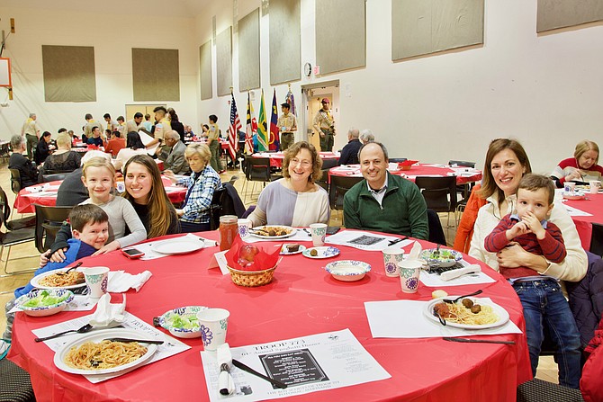 Patrick and Maryellen Grant; Dan, Diane, Jenna Berinstein; and Michael and Ellie Grant enjoy the spaghetti dinner on Saturday, March 9, at Potomac United Methodist Parish Center. Boy Scout Troop 773 held its 61st Annual Spaghetti Dinner. The all-you-can-eat dinner selections were prepared and served by Boy Scouts and Scout parents in casual, family-style seating. The dinner is the Troop’s only fundraiser for the year, and covers the cost of troop equipment and supplies.