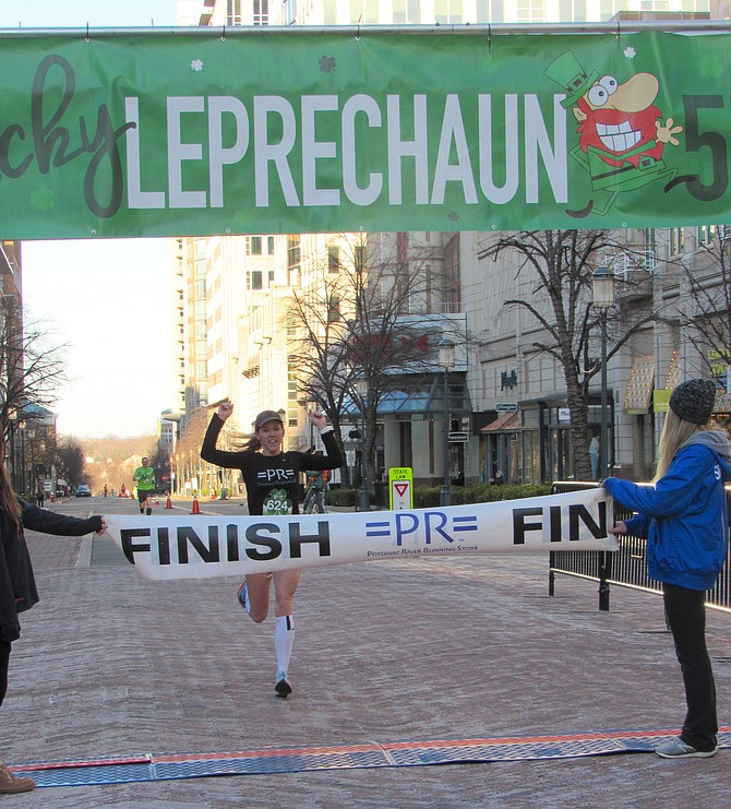 Oakton High School grad and current Midlothian, Va., resident, Keira D'Amato places first overall in the 2019 Lucky Leprechaun 5K Race produced by Potomac River Running and held at Reston Town Center on Sunday, March 17.