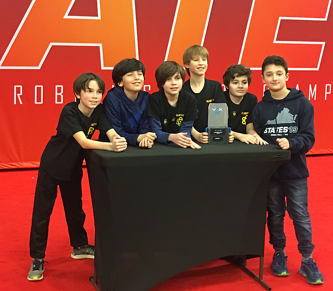 Drew Hull, 9, Youssef Bousaidi, 10, Liam Hull, 11, Matthew Mudry, 10, Daniel Murphy, 10,  and Alexander Abboud, 11, all students at Aldrin Elementary School in Reston were awarded the Second Place Robot Skills Award which they received at the VEX Robotics State Championship for the state of Virginia held in Doswell.