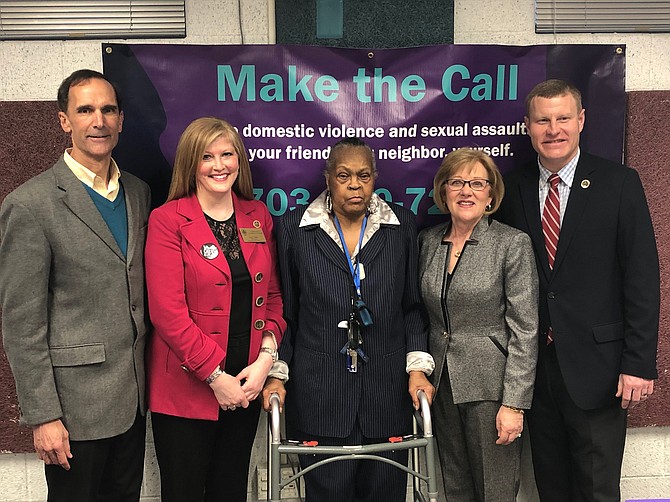 ‘The Three Musketeers’ who led the effort to get a new shelter for victims of domestic violence: Lisa Sales, Mattie Palmore and Karen Stone, with Supervisors Dan Storck (left) and Jeff McKay (right).