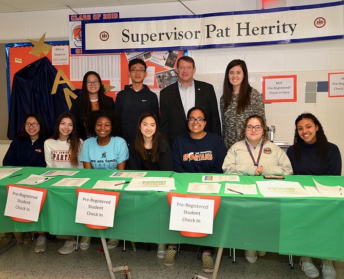 Here to help! Springfield Supervisor Pat Herrity, co-founder of the Teen Job Fairs and still its dedicated sponsor since 2015, and his army of volunteers at the ready to help young jobseekers sign in and get going.