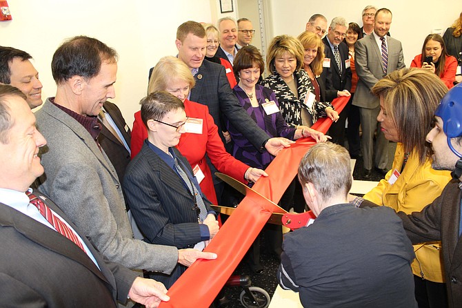 ServiceSource opened its eighth Community Integration Center in Springfield with an official ribbon-cutting ceremony on March 20.