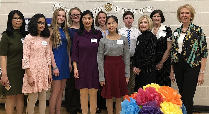 Attendees at the AAUW Mclean Area Branch Annual Dinner recognizing the winners of the STEM Essay Contest included, from left, Anita Banerjee, Anisha Talreja (Honorable Mention), Samantha Taylormoore (Honorable Mention), Melissa Taylormoore, Xin Li, Heather Walcott, Isabella Cai (1st Place), Peyton Walcott (2nd Place), Myrtle Hendricks-Corrales (Branch Co-President), Betsy Schroeder (Branch Co-President), and Judy Page (Branch STEM Chair).