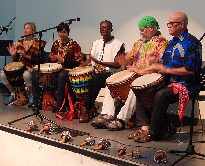 Kofi Dennis and Friends illustrate traditional African rhythms.