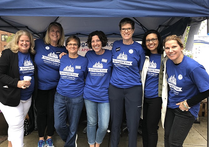 ACT for Alexandria CEO Heather Peeler, second from right, joins Jen Walker at Stomping Ground Restaurant in Del Ray at the 2018 Spring2Action community giving day. This year’s event is set for April 10.