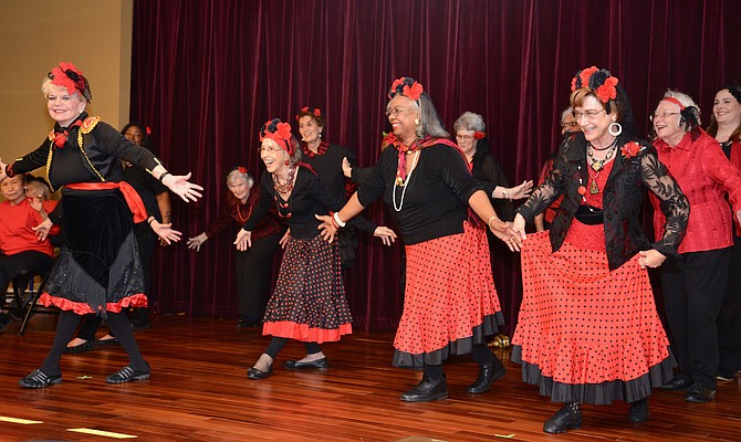 “Hey, Macarena!” The “Motion is Lotion” Dance Troupe opens the Vinson Hall Talent Show – part of the 50th anniversary of the retirement community. Led by resident Midge Holmes, the dancers kicked things off with flair and had audience members dancing in the aisles.