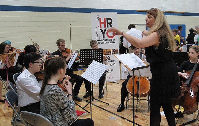 The Herndon Youth Orchestra directed by Laura Readyoff volunteers their musical talents for the 35th Annual Mayor’s Volunteer Appreciation Night.