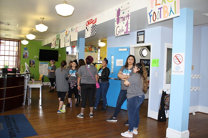 Area Starbucks employees help the Boys and Girls Club in Alexandria fix up the appearance of the club.