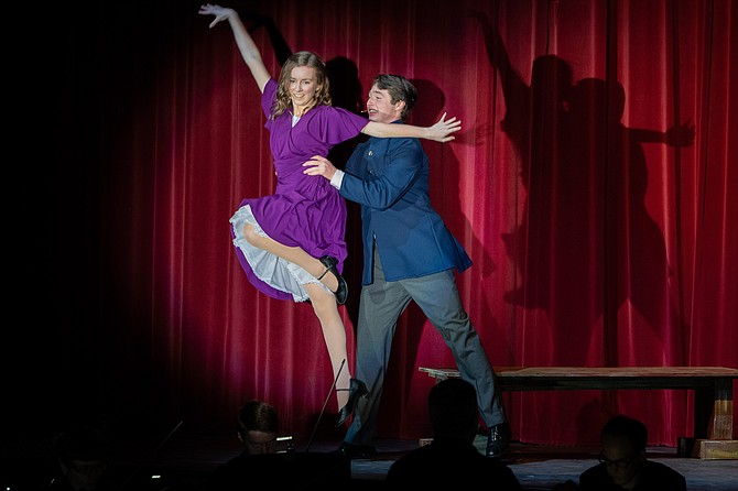 Cara Ainge and Henry Metcalf in Herndon High School’s production of the “Sound of Music.”