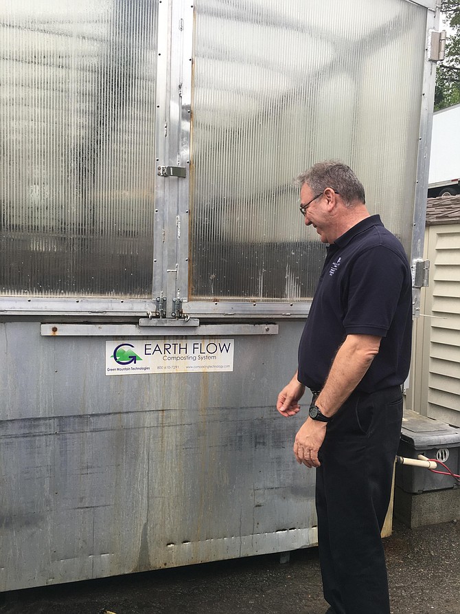 Erik Grabowsky stands next to the in-vessel composter. Arlington County offers a compost drop-off service (all food listed on the bin) for county residents. The Solid Waste Bureau also partners with AFAC (Arlington Food Assistance Cooperative) to take food which needs to be disposed of, saving them a lot of money. They support the food scrap drop-off at Columbia Pike farmers’ market too.