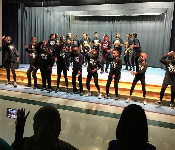 A drum line performance by students during the Black History performance held at Bells Mill Elementary School Friday.