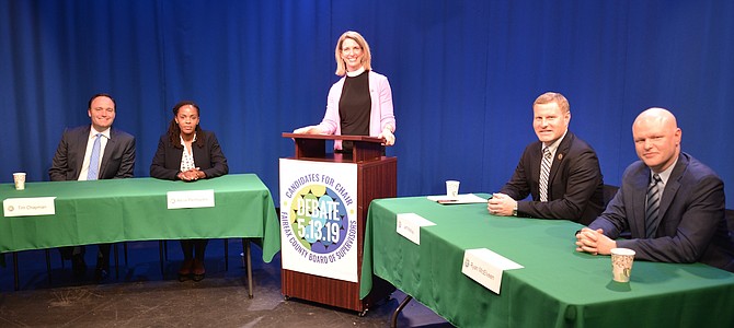 The Democratic candidates for the chair of the Fairfax County Board of Supervisors, heading for the June 11 Primary election, debate at a live televised event, hosted by the Fairfax Healthy Communities Coalition. Moderator Pastor Sarah Scherschligt is flanked by candidates Tim Chapman and Alicia Plerhoples on the left, and Jeff McKay, Lee District Supervisor, and Ryan McElveen, At-Large member of the FC Public Schools Board on the right.