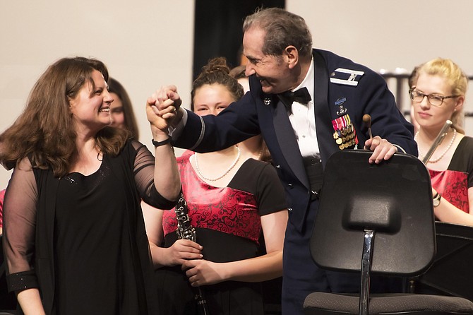 Herndon Band Director Kathleen Jacoby with Col. Arnald Gabriel.