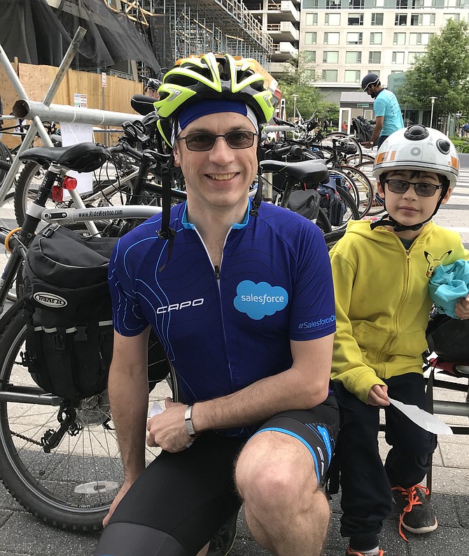 Ian Macdonald of Herndon and son Callum, 8, cycle to school as much as possible.