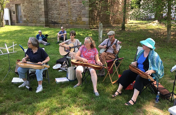 Members of the Northern Virginia Mountain Players perform during the Great Falls Park Spring in the Park Festival Saturday.