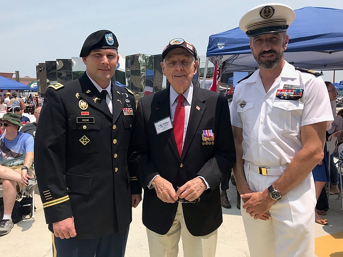 WWII and D-Day survivor Lincoln Harner, center, of the US Army 987th Field Artillery Battalion (Gold Beach), with LTC John Roche, Commander Headquarters and Headquarters Battalion 29th Infantry Division, and Cedric Chetall, Capt. NW France, at the 75th D-Day Commemoration Ceremony June 1 at Waterfront Park.