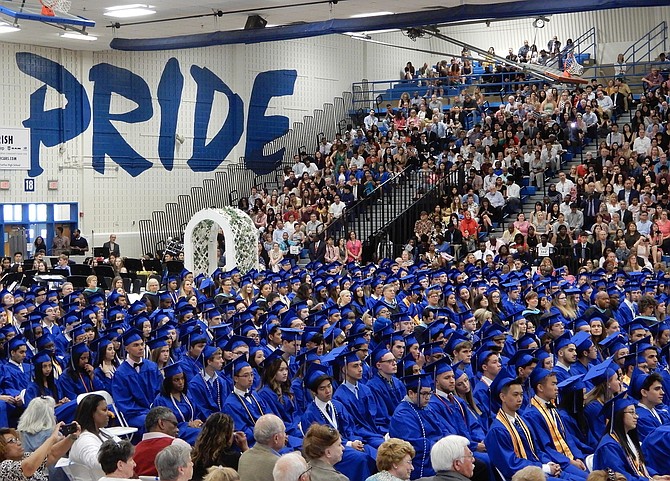 Members of Fairfax’s Class of 2019 wait to be pronounced graduates.