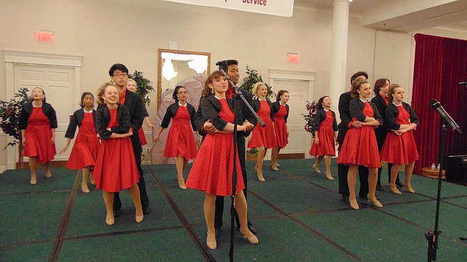 The Chantilly High School Showstoppers Show Choir performs.