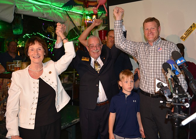 Celebrating the victory, from left: Fairfax County Board of Supervisors Chair Sharon Bulova, U.S. Rep. Gerry Connolly (D-11) and Lee District Supervisor Jeff McKay. Connolly was chairman before he was elected to Congress.