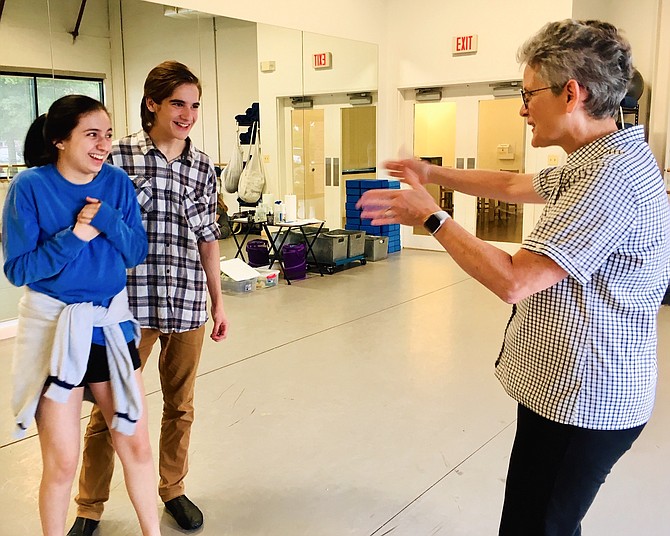 Annie Farias (as Katherina) and Lewis Bliss (as Petruchio) rehearse a scene from “The Taming of the Shrew” with director, Barbara Schwartz.