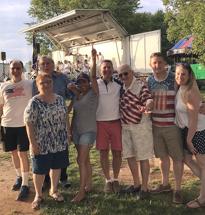 After Modern Vintage performed at the Lake Fairfax Park Independence Day Celebration, its members and their families and friends donned patriotic shirts, and spent time together ready to listen to The U.S. Navy Band Commodores perform.