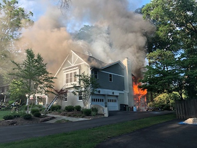 Fire Investigators determined that the fire was accidental in nature and started on the deck when one of the occupants attempted to light the propane grill.
