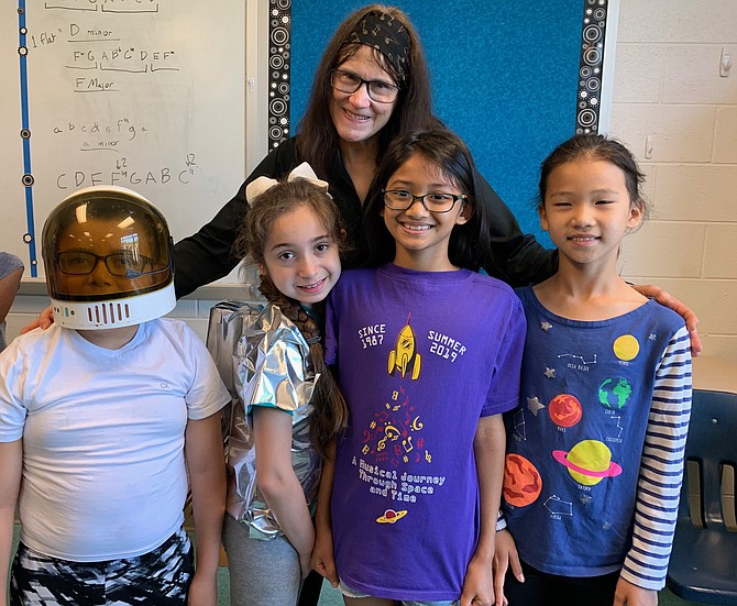 Instructor Ruth Donahue pictured with her students, Mateo Swartz, 10, Saba Akrami, 9, Oviyah Ramakrishnan, 9, and Alice Guo, 8 – all of McLean.