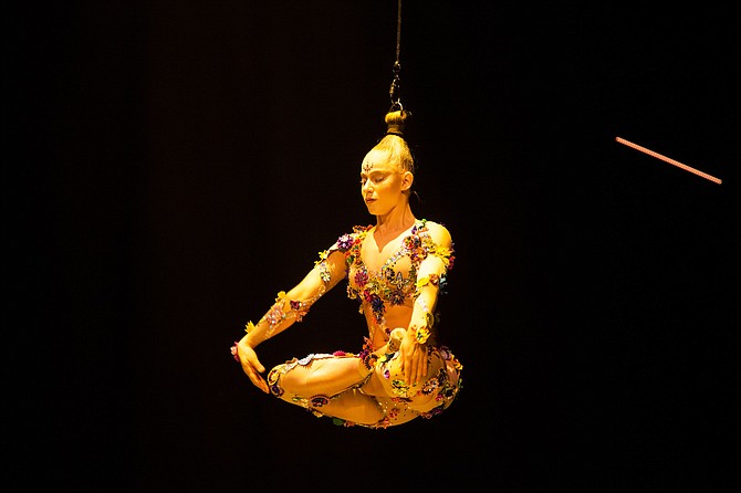 Danila Bim, hair suspension artist in “Volta” from Cirque du Soleil.