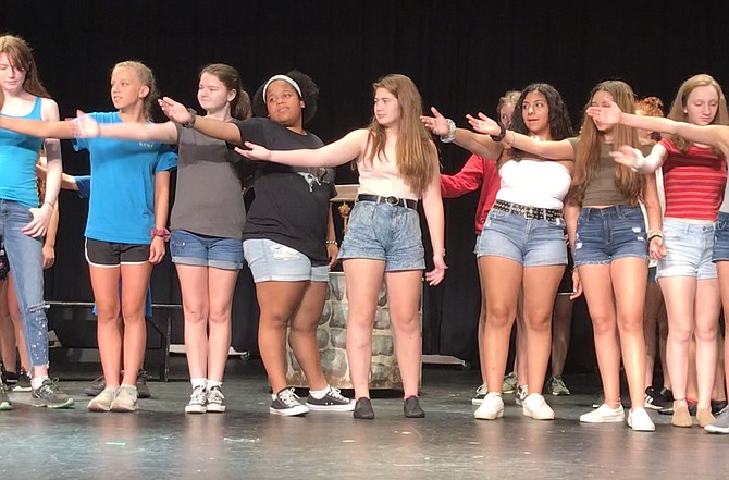 Summer Grand students rehearse Disney's Beauty and the Beast.