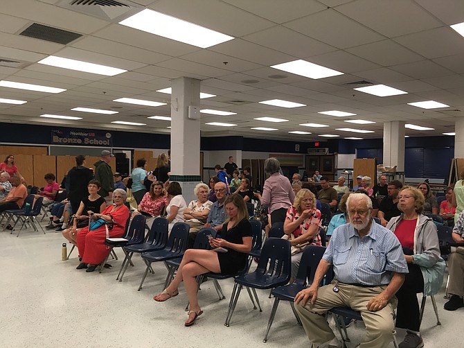 Residents around Rose Hill gathered at the school to hear the police.