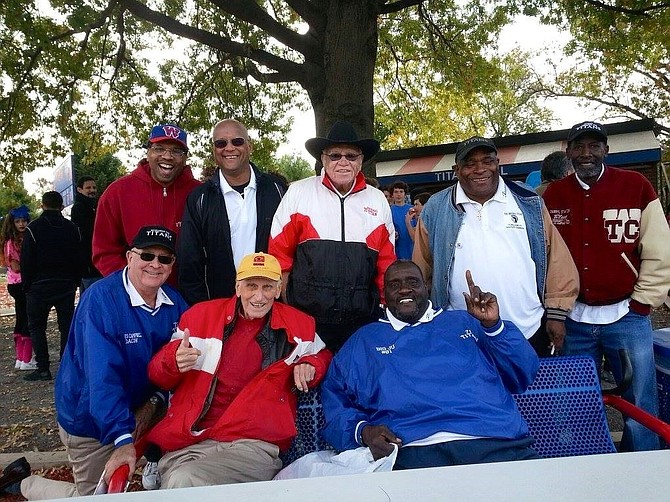 Petey Jones, standing second from right, with coaches and teammates of the ’71 Titans football team at the 2015 50th anniversary of T.C. Williams High School. Jones died July 1 at the age of 65.