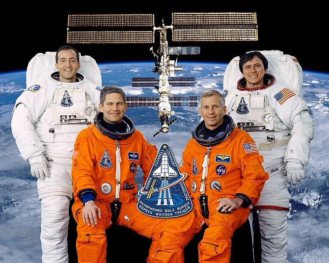 Alexandria businessman Paul Lockhart, second from left, as pilot of the crew of the Space Shuttle Endeavour in December of 2002. With him are Commander Kenneth Cockrell and Mission Specialists Franklin Chang-Diaz and Philippe Perrin.