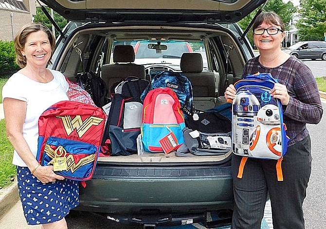 Unity of Fairfax Church collected $1,000 and 25 backpacks to support Britepaths’ Collect for Kids program last year. From left, Nancy Schneider delivers backpacks and checks to Seasonal Programs Manager Joanne Walton.