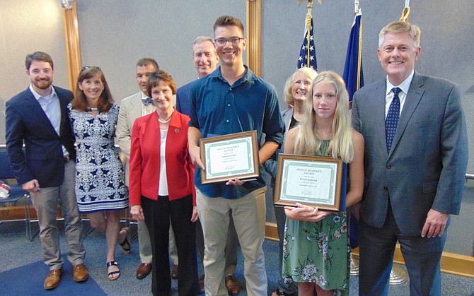Winning Young Persons of the Year are James Kendall and Evyn VanBrunt with, from left, Alex Robbins representing U.S. Rep. Gerry Connolly’s office; Megan McLaughlin, School Board member from the Braddock District; State Sen. Chap Peterson (D-34); Sharon Bulova, Chairman of the Board of Supervisors; Del. David Bulova (D-37); Del. Vivian Watts (D-39); and Braddock District Supervisor John C. Cook.