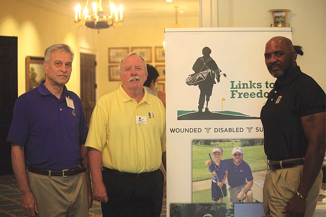 Chairman of the Golf Committee Tony Henry (right) with two other volunteers from Links to Freedom.